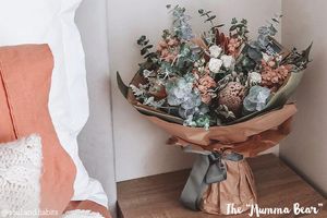 Muma Bear with beautiful bouquets 